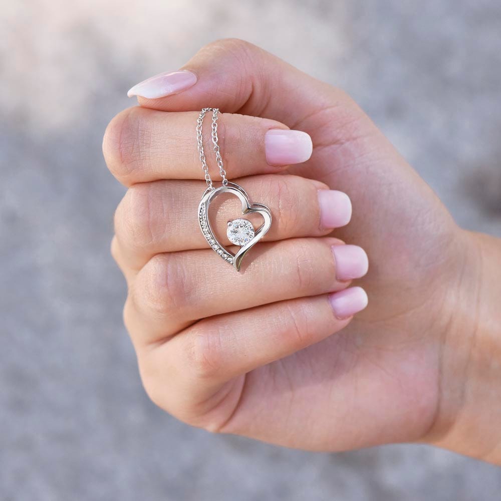 Yellow gold heart pendant close-up
